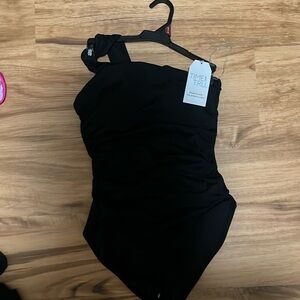 New with Tags from Target. Fits true to size